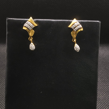 Gold earrings by S.P. Jewellers