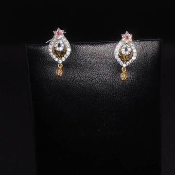 gold diamond earrings by S.P. Jewellers