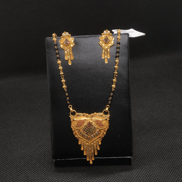 Gold big mangalsutra by S.P. Jewellers