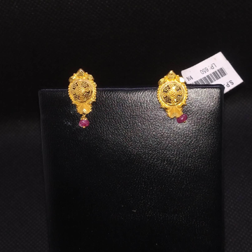 Gold earrings by S.P. Jewellers