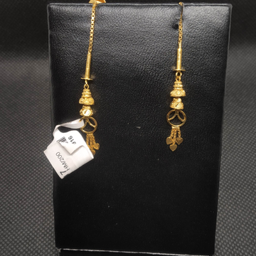 gold earrings by S.P. Jewellers